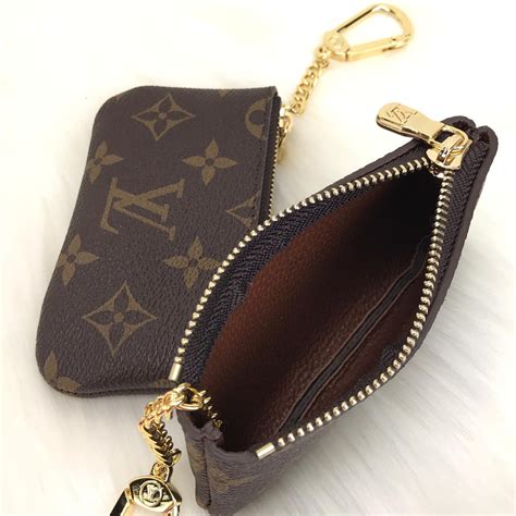 louis vuitton silver lock and key|Louis Vuitton coin pouch keychain.